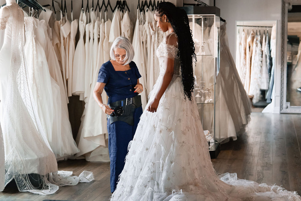 Crafting Bridal Elegance: The Precision of Gown Alterations